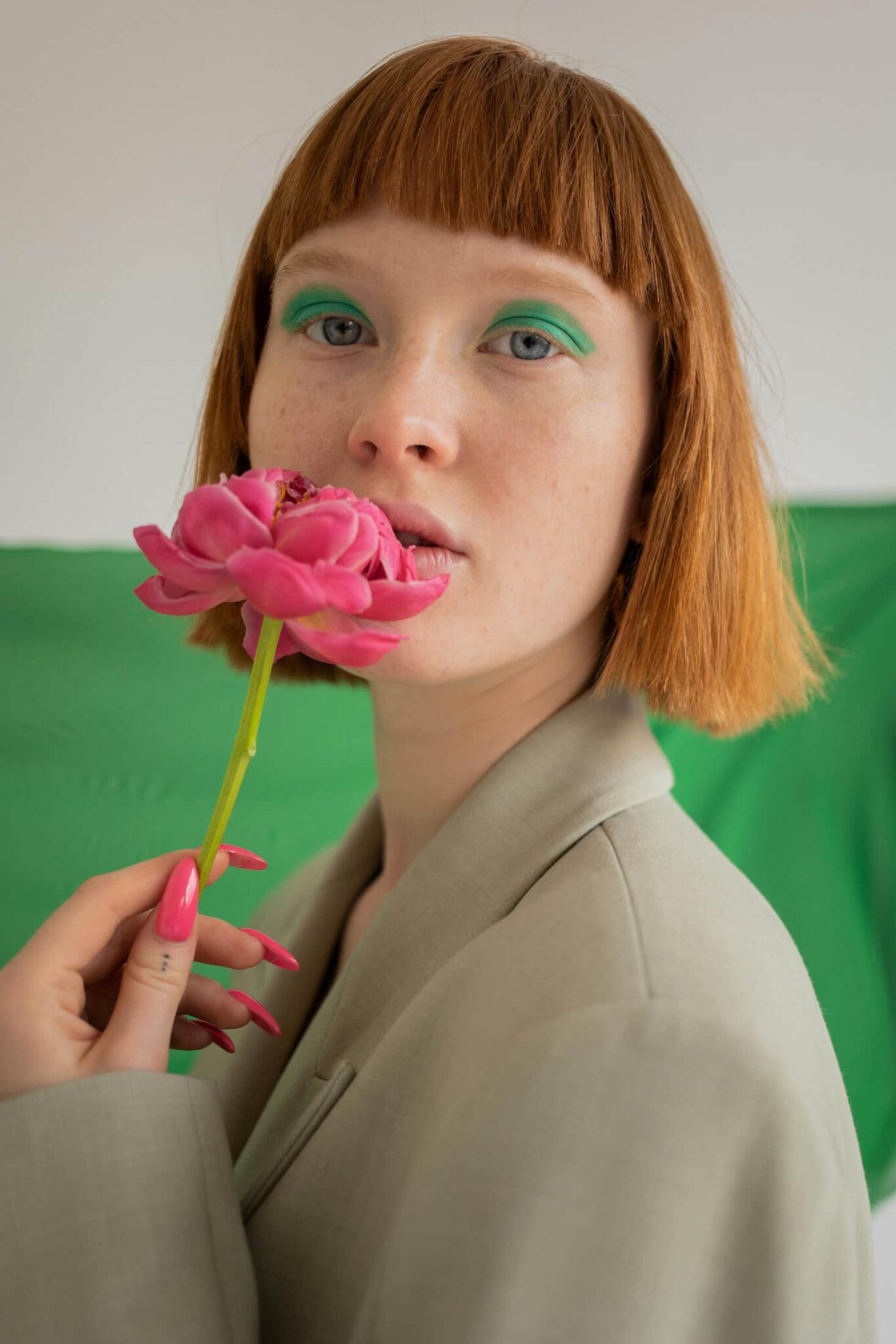 woman with green makeup
